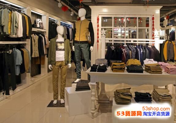 服装店黑白货架摆设图片